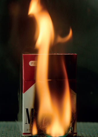Josh Kline: Climate Change Postcard (Cigarettes)
